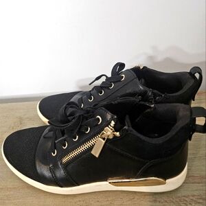 Black high top sneakers